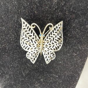 Avon Butterfly with blue eyes brooch.